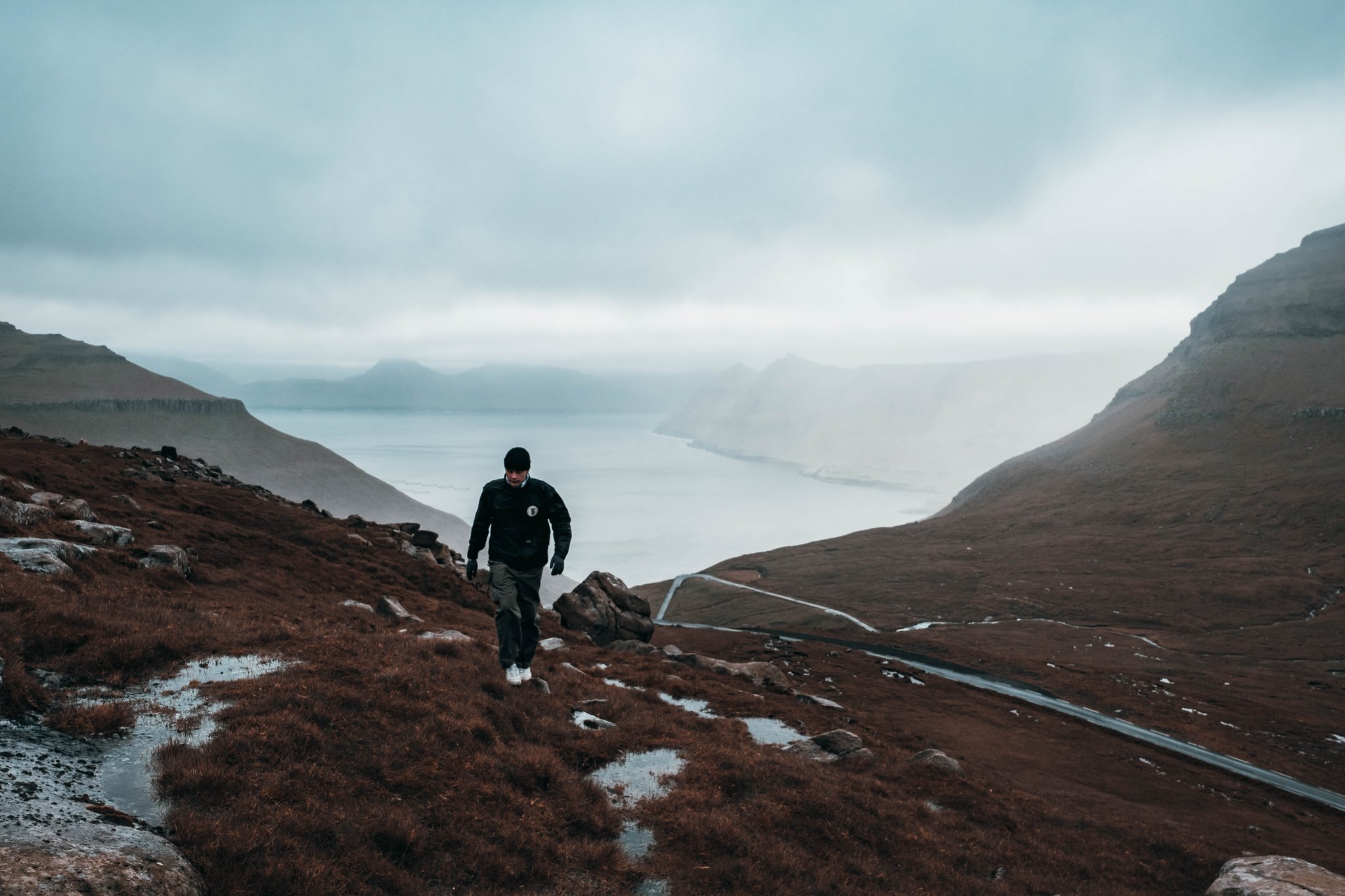 Odin Oddekalv walking through the Faroe Islands